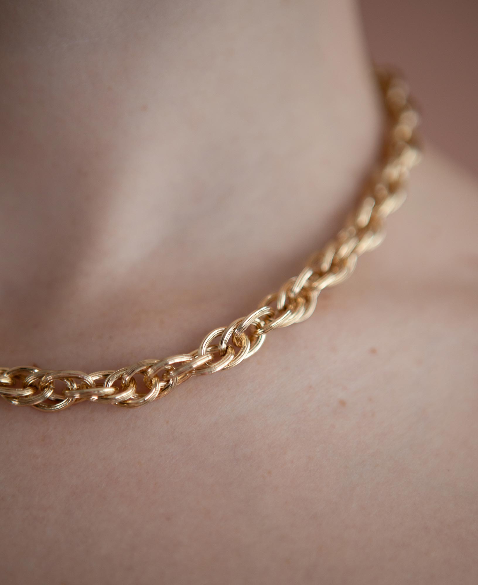close up model shot of emma chunky chain gold necklace
