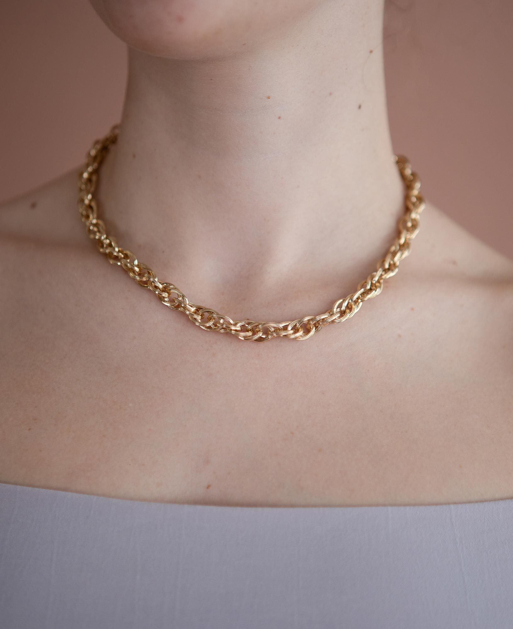 close up model shot of emma chunky chain gold necklace