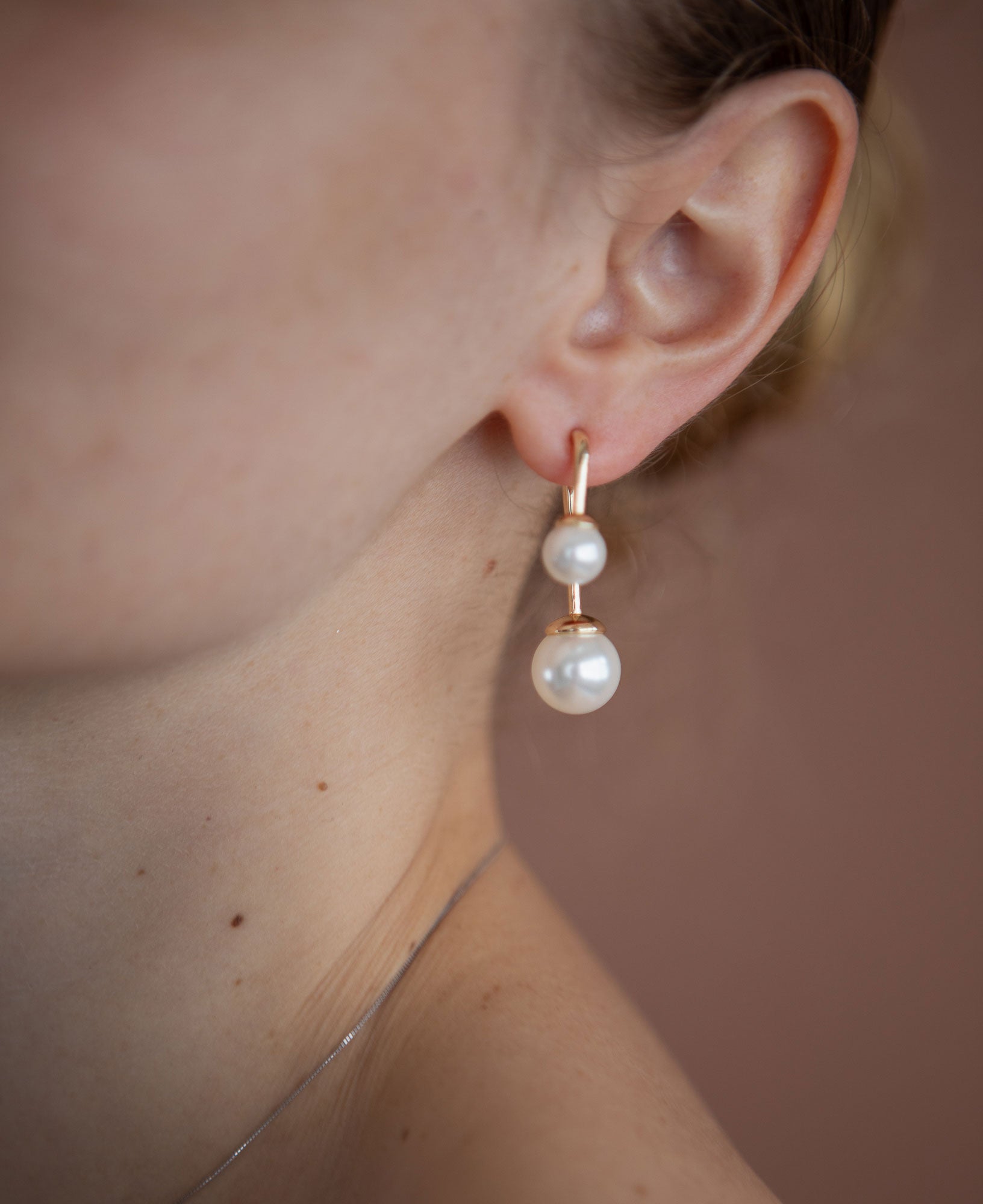 model shot of august pearl threader earrings