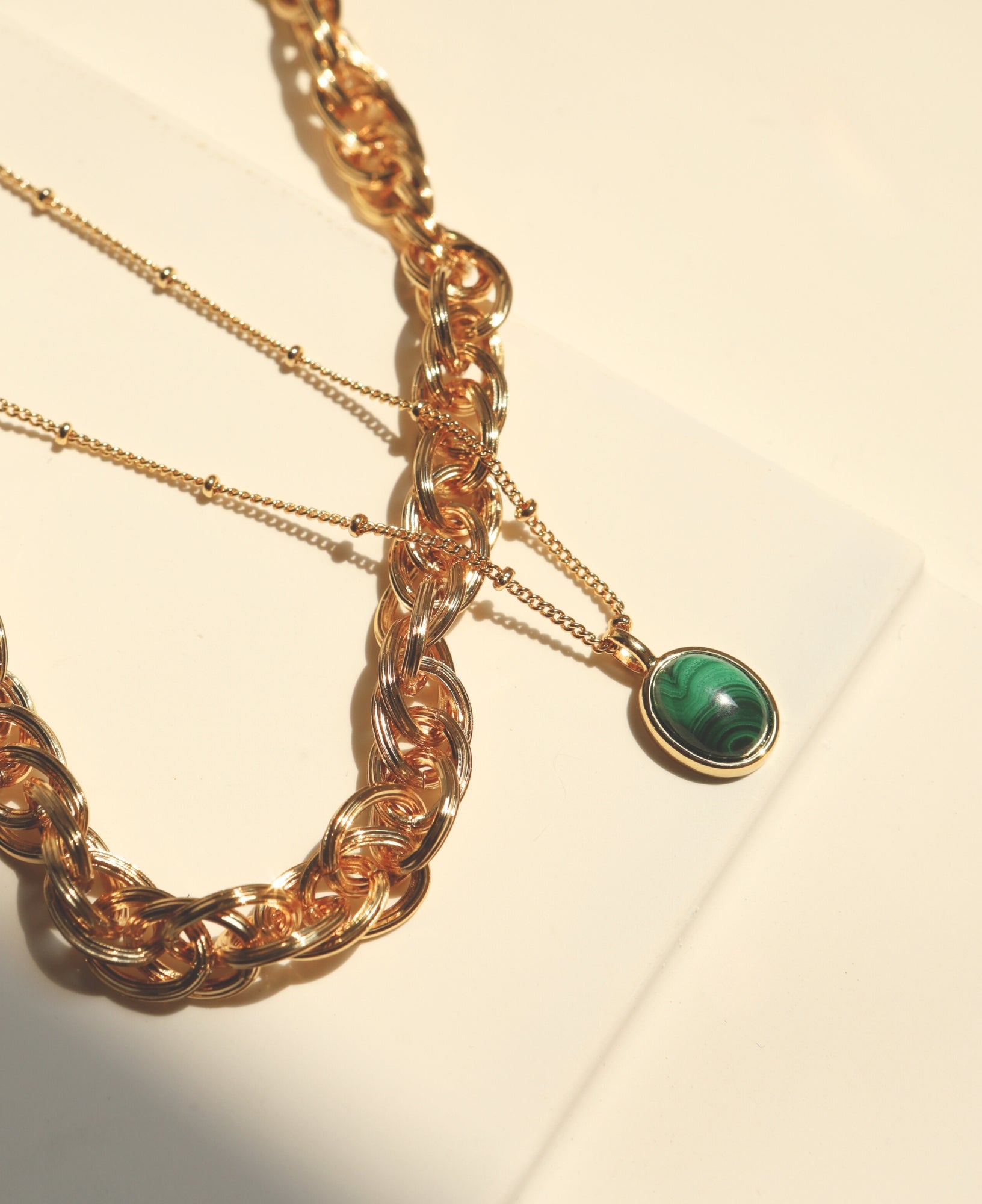 flat lay product pictures of emma gold chunky chain necklace