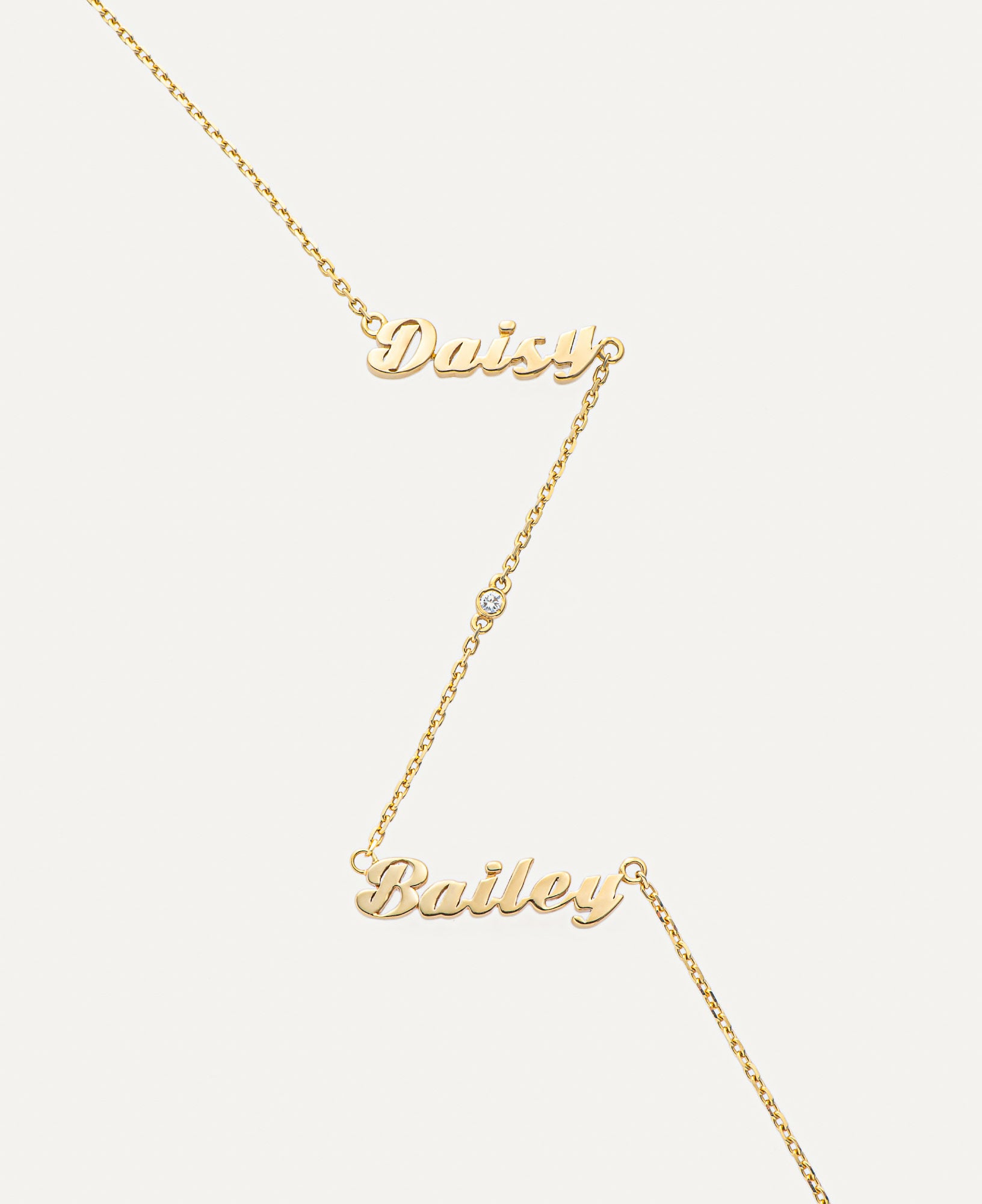 product shot of grace custom multi-nameplate necklace with diamond
