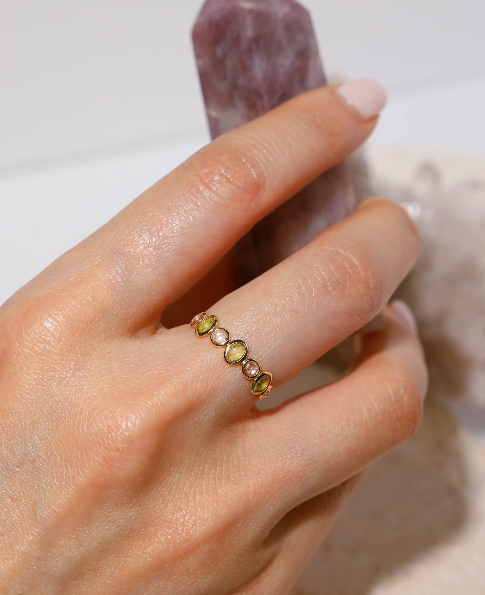 model shot of genevieve half eternity solid gold ring 