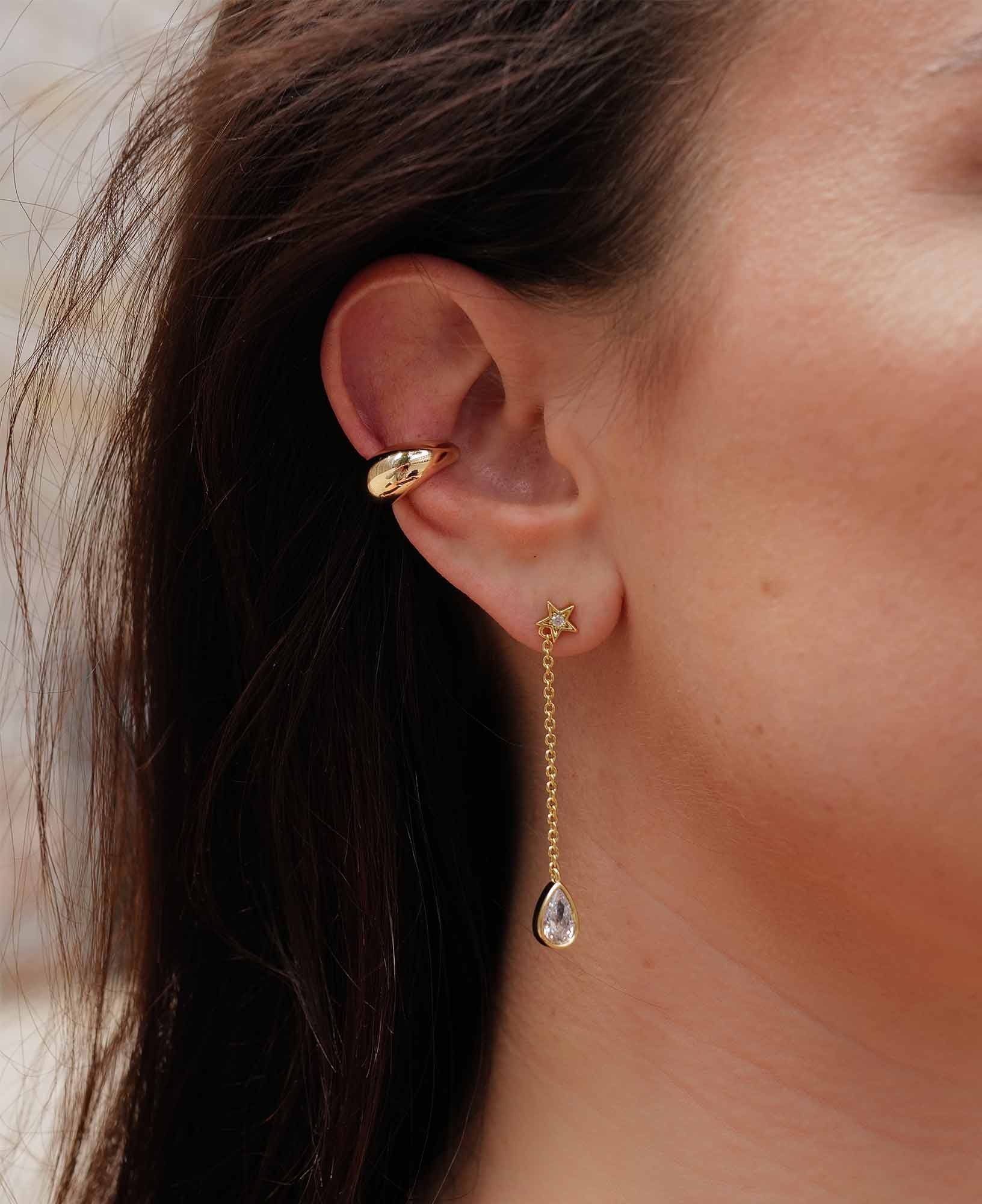 model shot of victoria 14k gold drop earrings and betsy chunky ear cuff