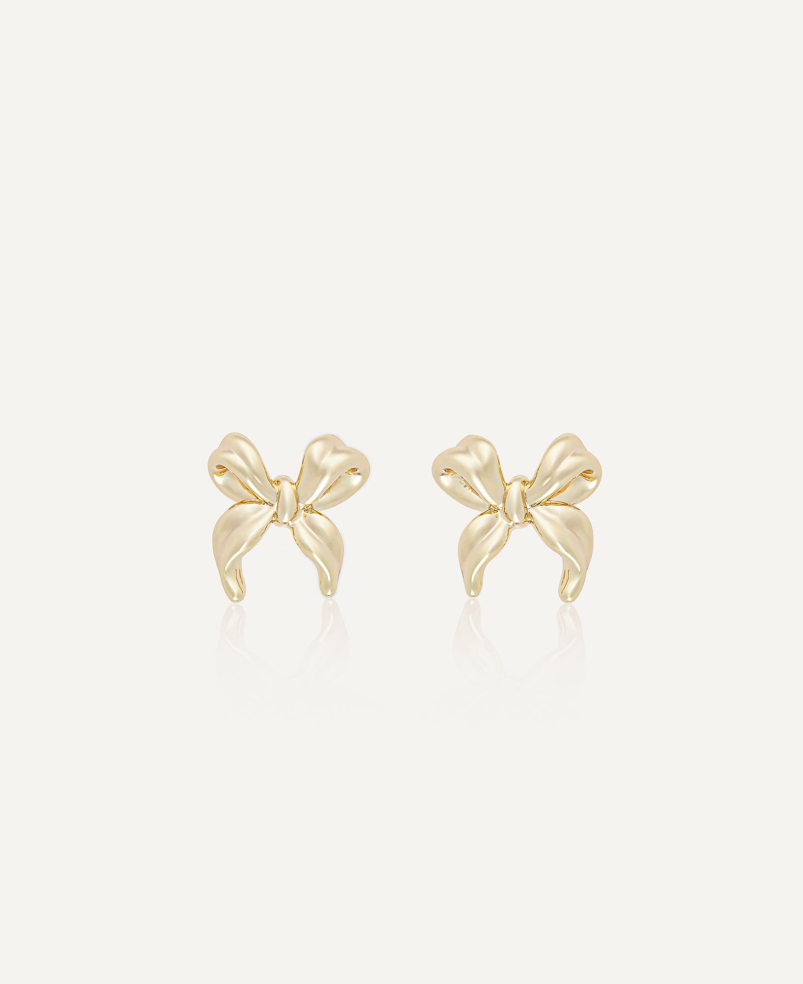 product shot of Diana Gold Ribbon Earrings