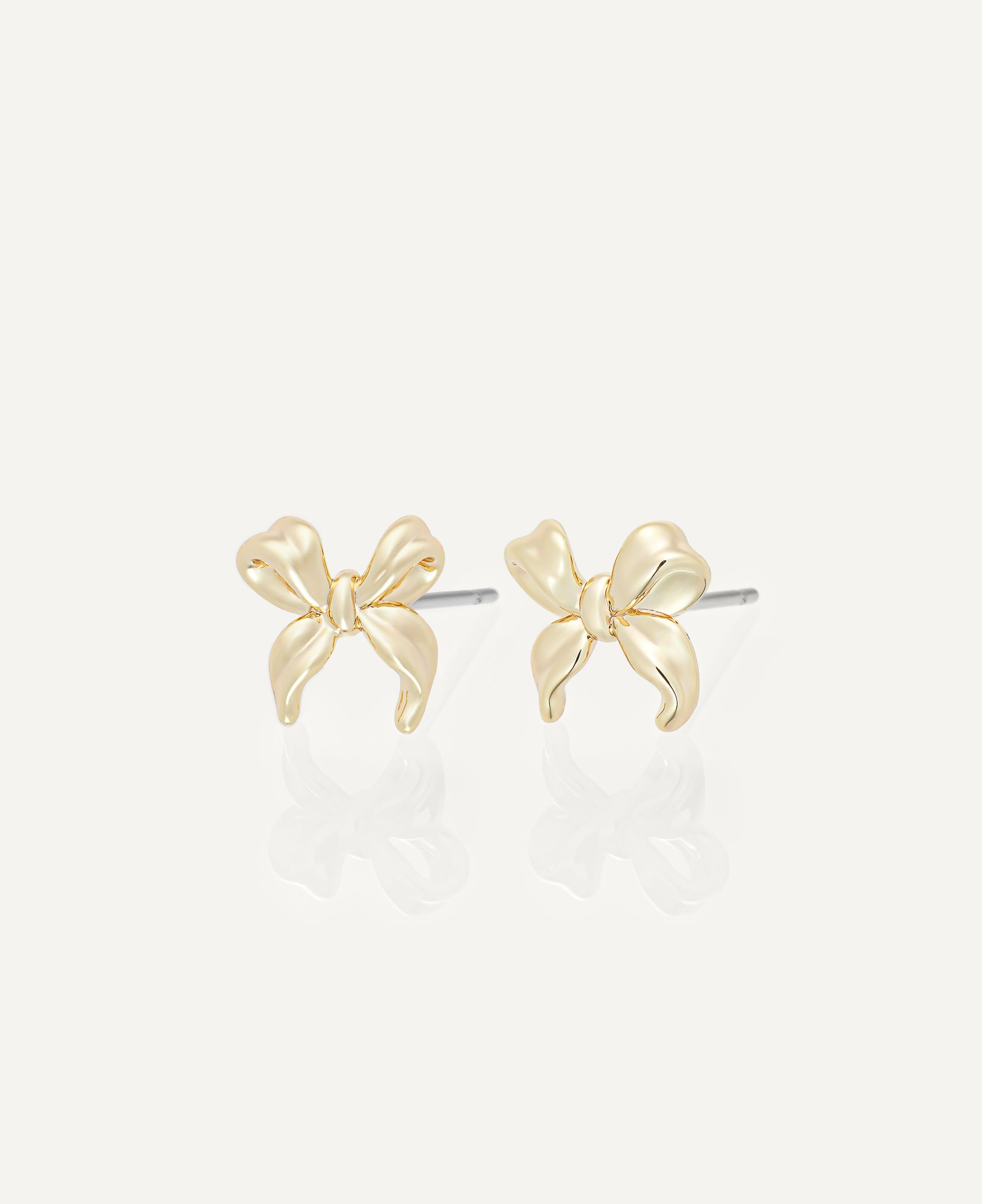 product shot of Diana Gold Ribbon Earrings