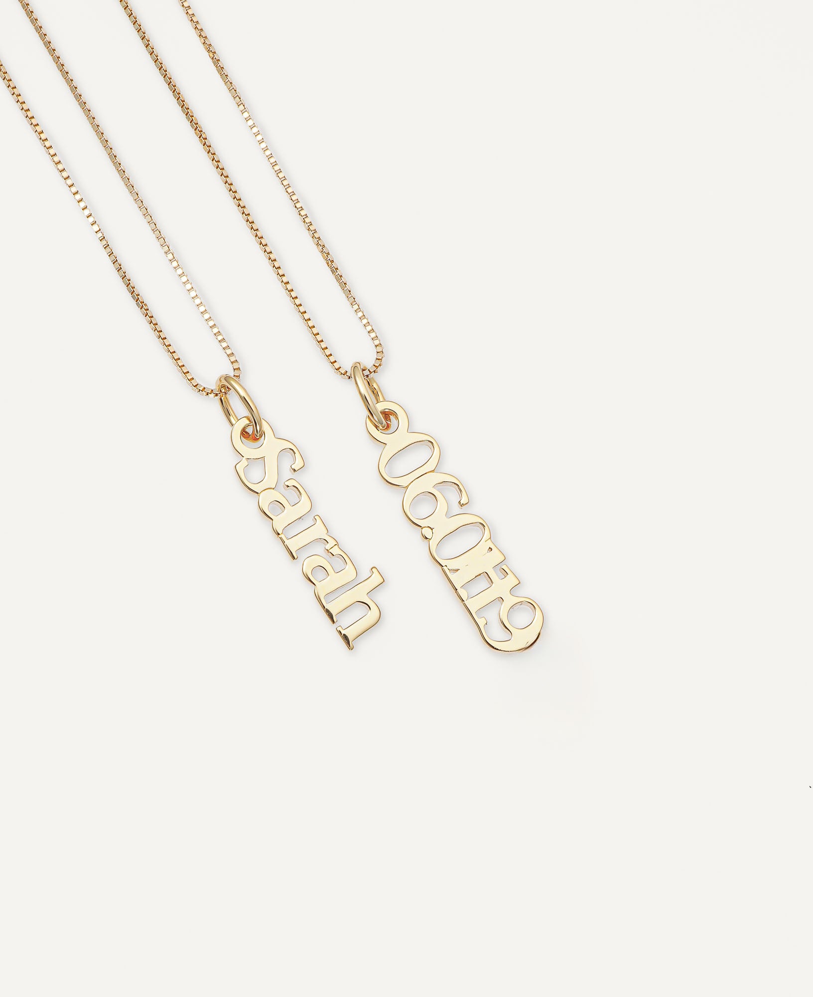 product shot of Valentina Custom Vertical Name Pendant Necklace in 14k Yellow Gold 