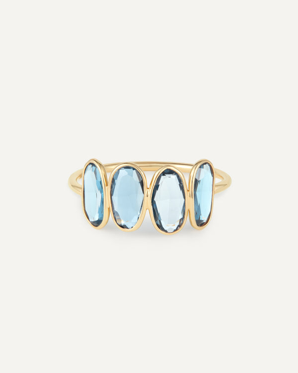 product shot of marjorie blue topaz solid gold ring