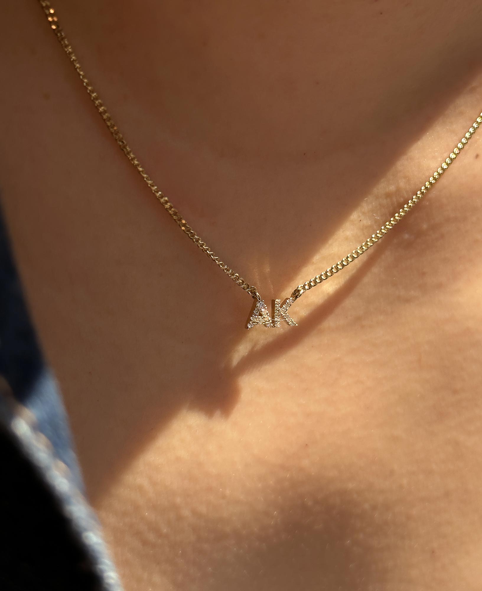 model shot of lottie custom diamond nameplate chain necklace