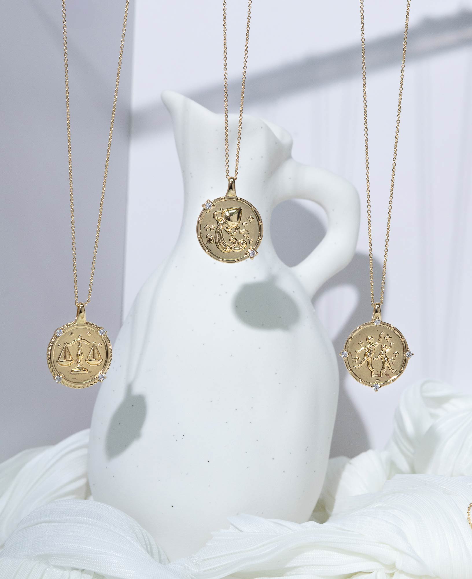 artistic lifestyle product image of Libra, Aquarius and Gemini Horoscope Gold Pendant Necklaces.