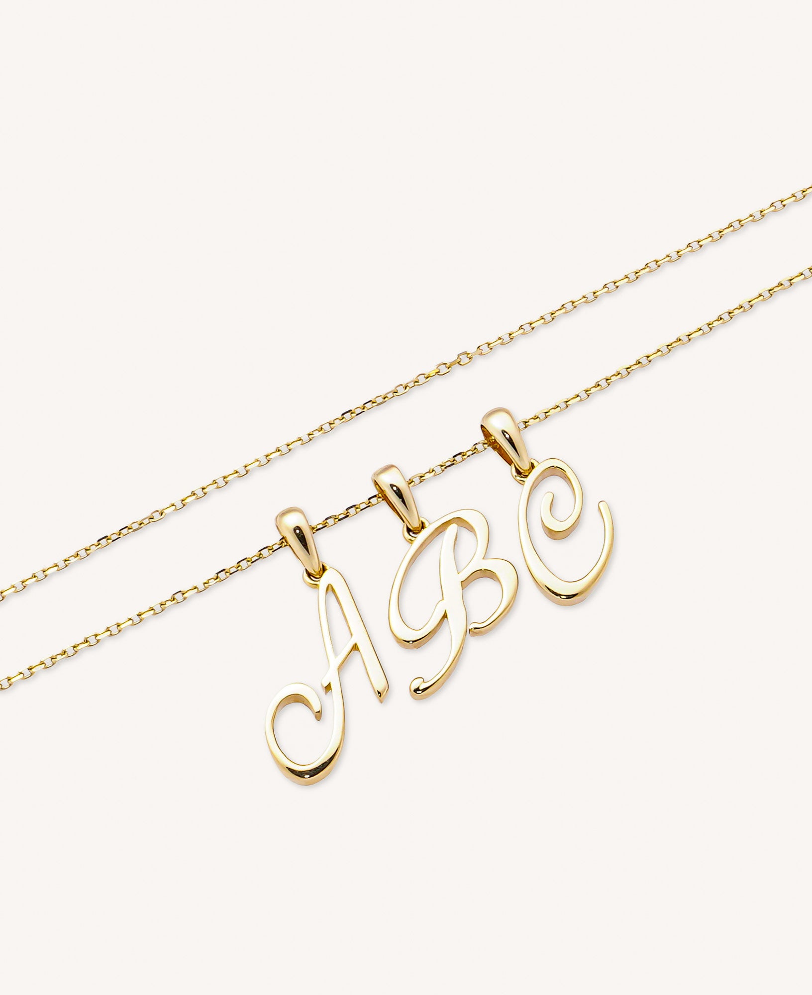 Lucia Custom Script Initial Solid Gold Charm Necklace