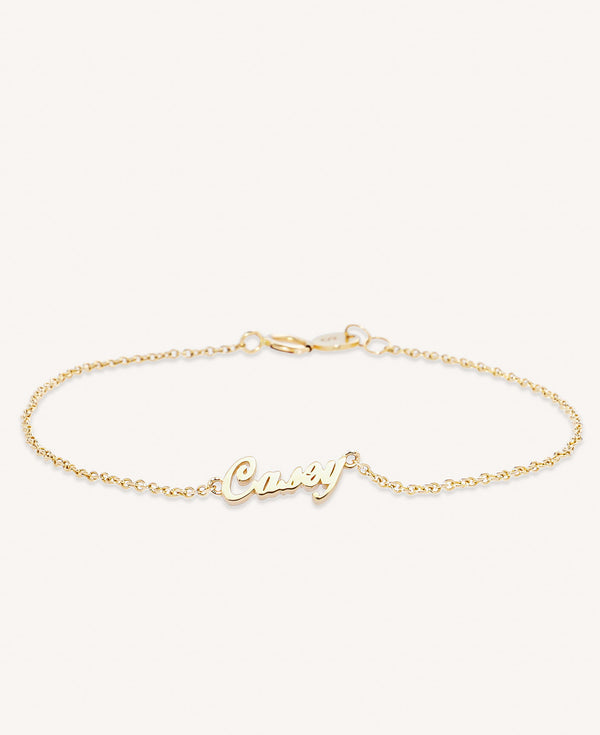 Evie Custom Script Solid Gold Nameplate Bracelet