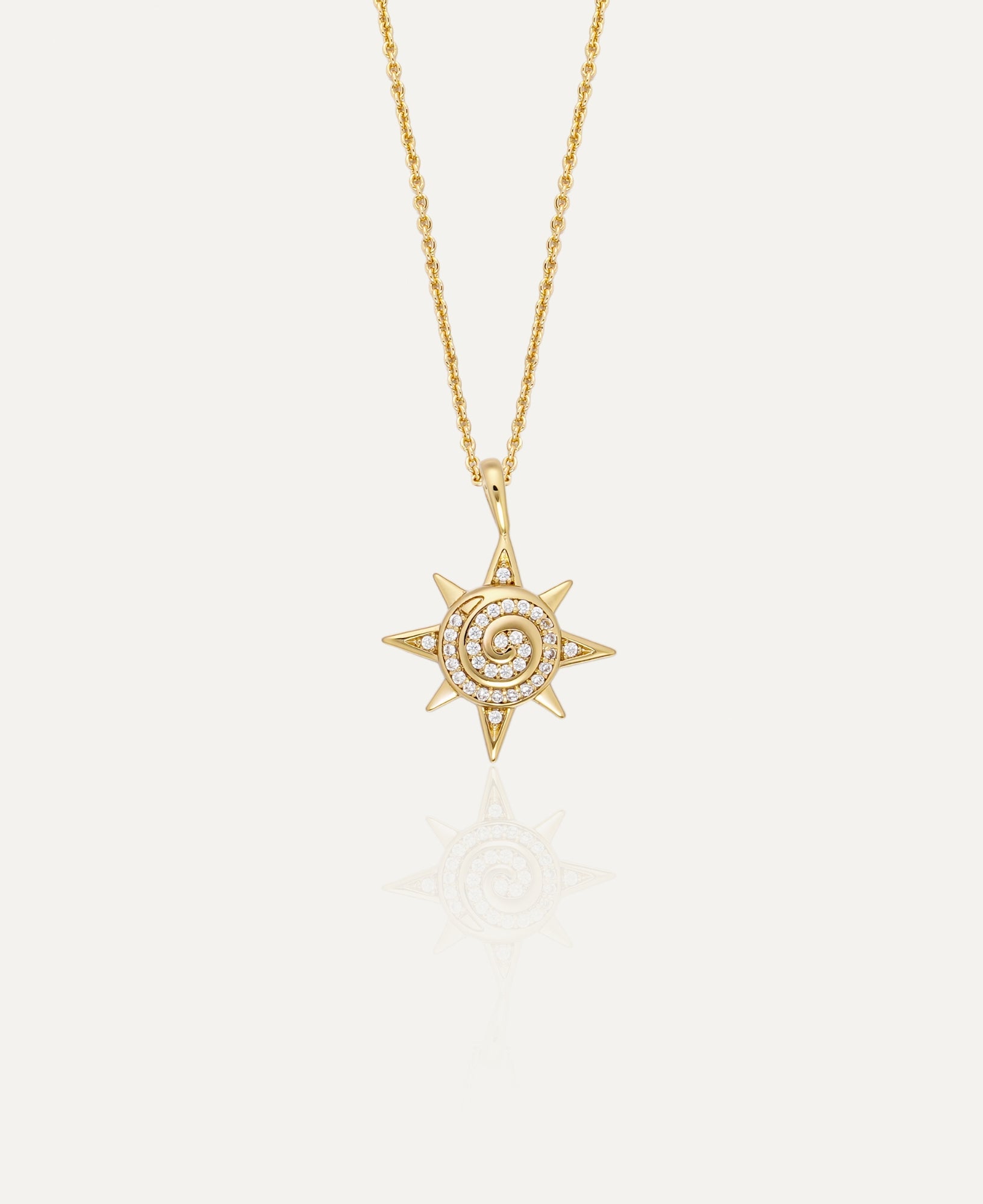 Sachelle Collective Sun Charm pendant featuring a radiant sun design with intricate detailing, perfect for adding a sunny touch to any jewelry collection.