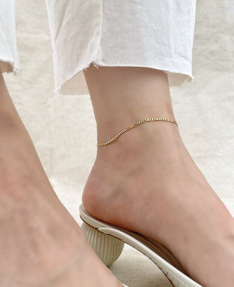 Lifestyle shot of Adeline 14k Gold-filled Chain Anklet from Sachelle Collective