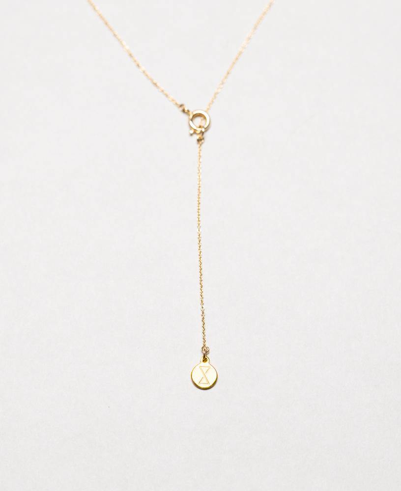 details end tag of 18k gold necklace  - sachelle collective