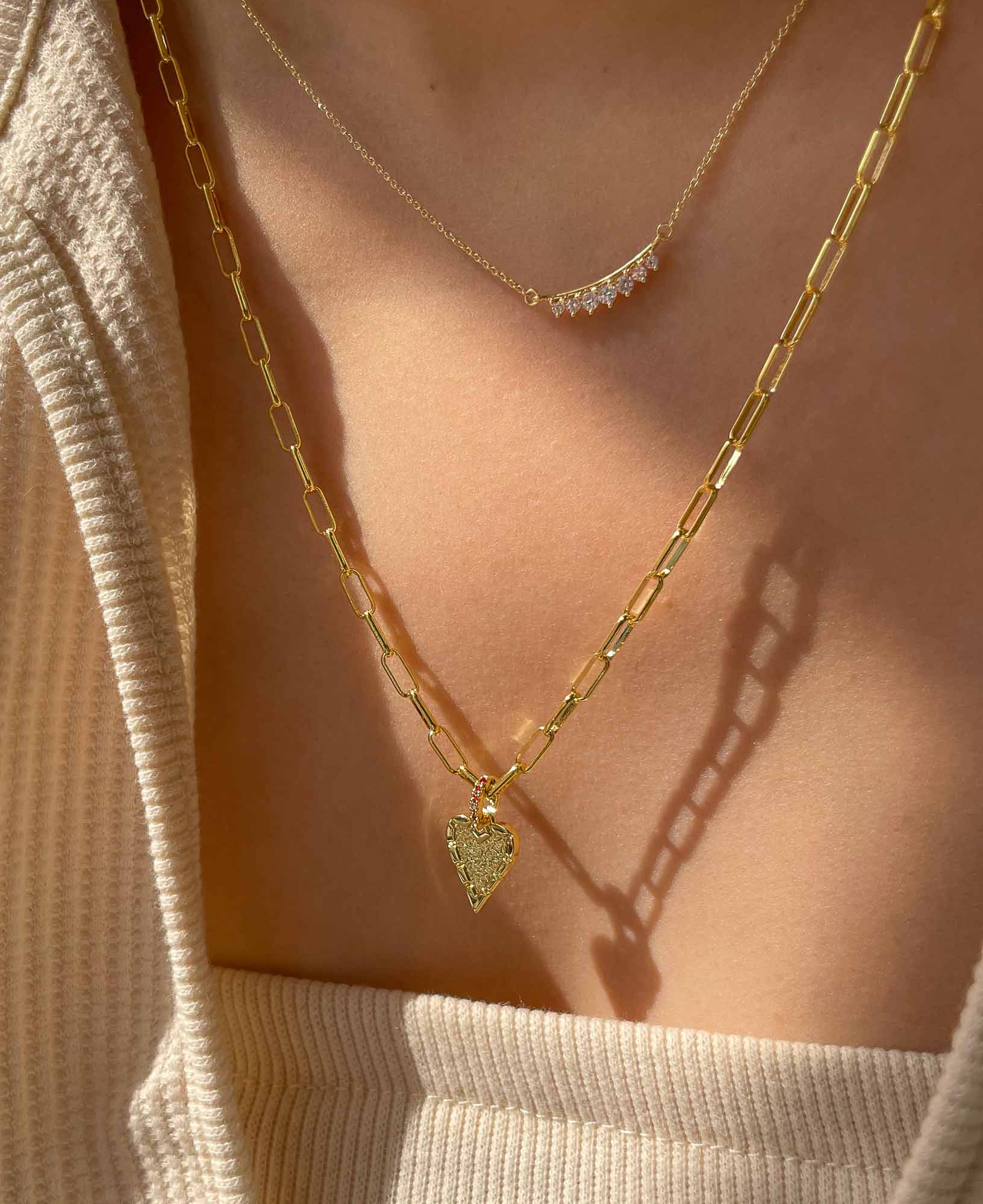 Model wearing belle heart chain necklace