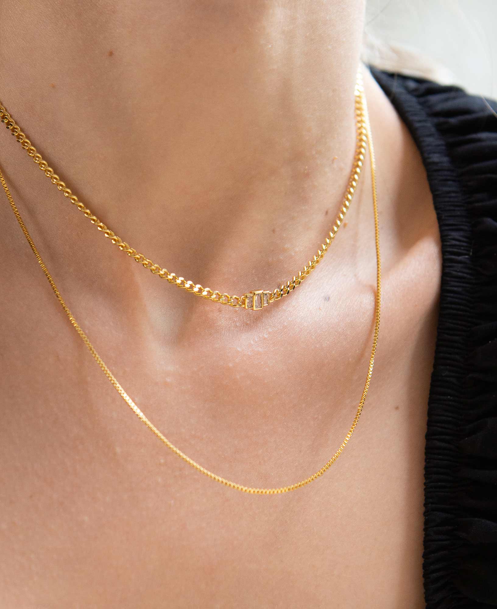 Simple layering with Model wearing Agnes 14k Gold Chain Necklace