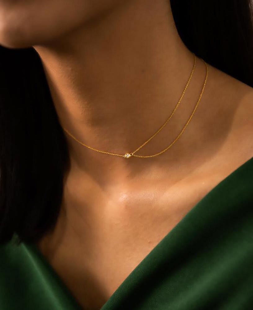 Noemie Double asymmetric Chain Bezel 14k Gold Necklace on model lifestyle shot- sachelle collective