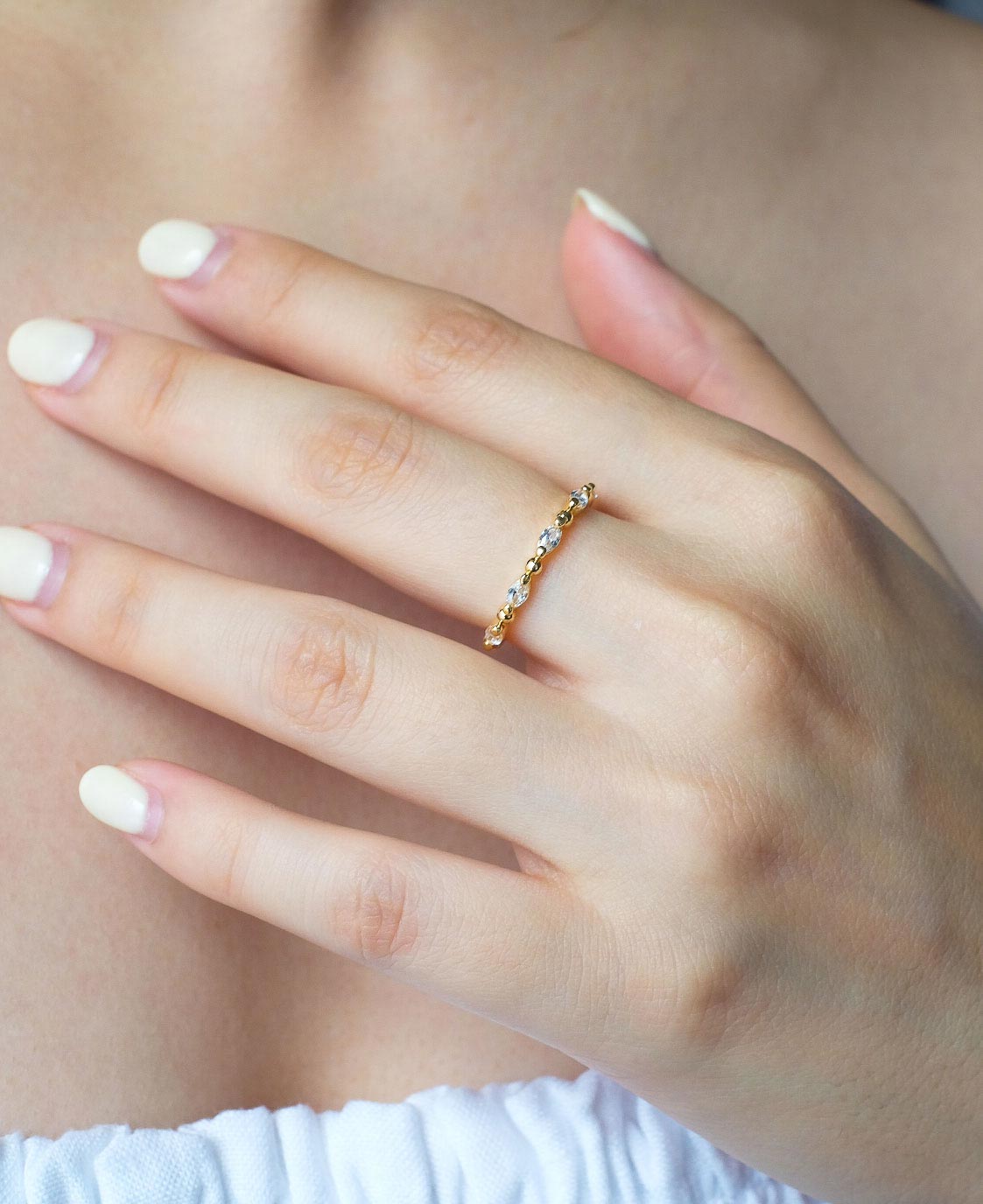 Model wearing Meline 14k Gold Bead Ring from Sachelle Collective